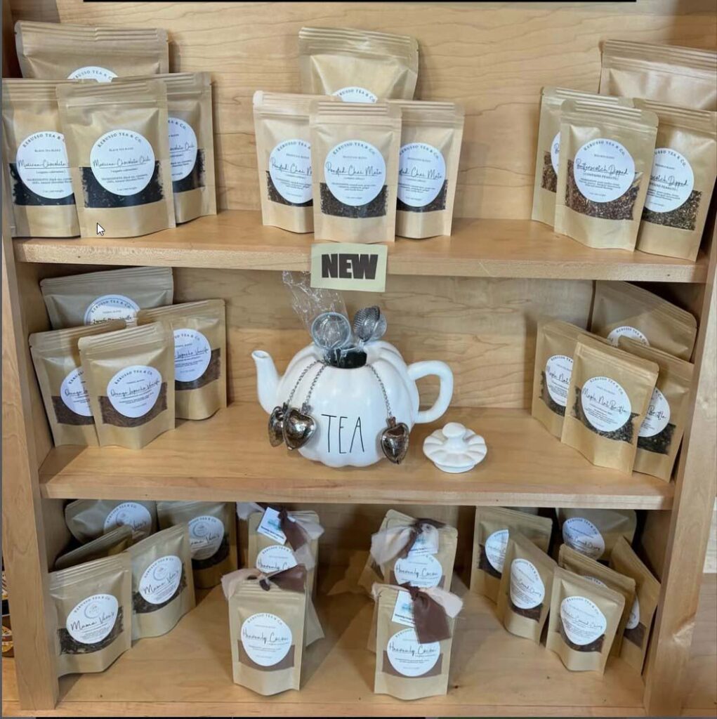 Image of multiple brown tea back on a shelf